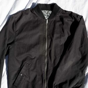 Stussy black coaches bomber with skull lining